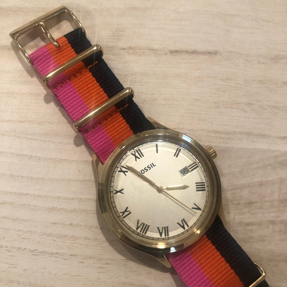 NWOT Fossil gold watch with pink/orange/navy band!